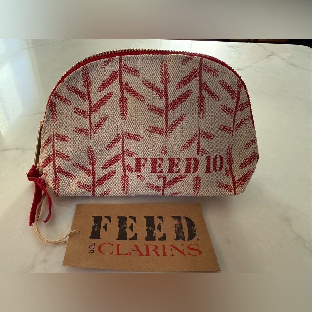 🆕 FEED x Clarins Small Toiletry Makeup Cosmetic Zippered Pouch Bag Tan Red Clean